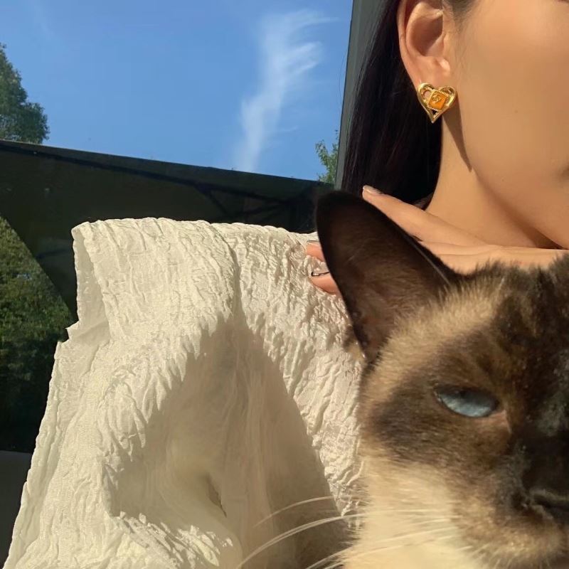 Ch**el earrings